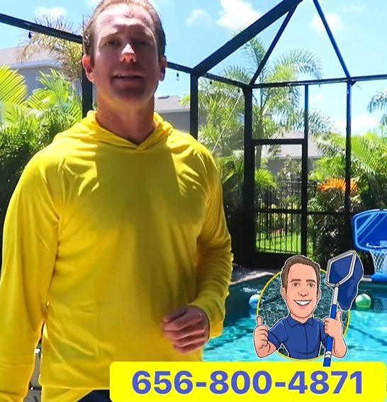 Micah, owner of Neighborhood Pool Guys, beside a screened pool